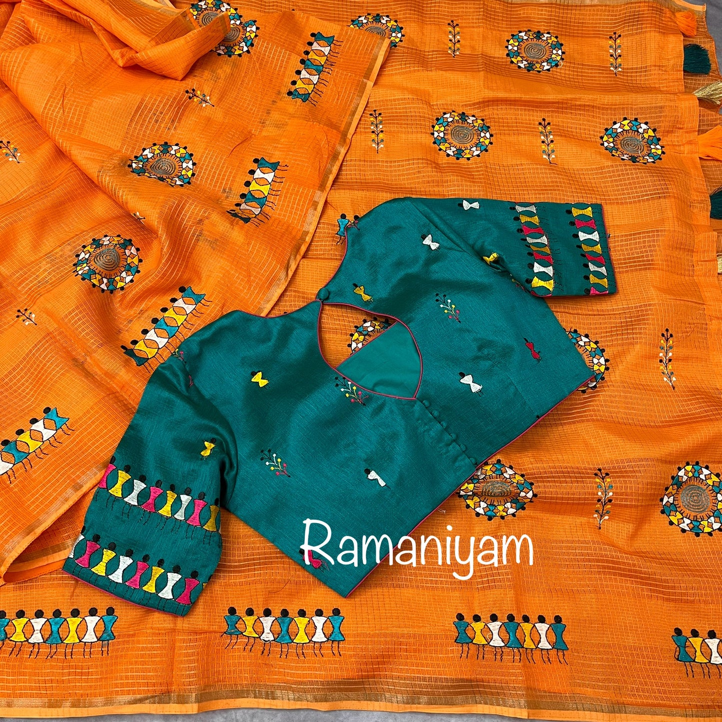 Orange Kota saree with warli embroidery