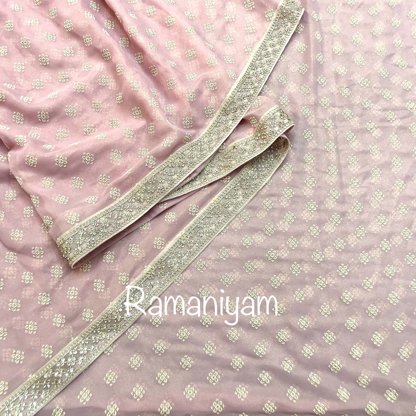 Rose pink tissue georgette saree with stone work borders and metallic rose pink blouse