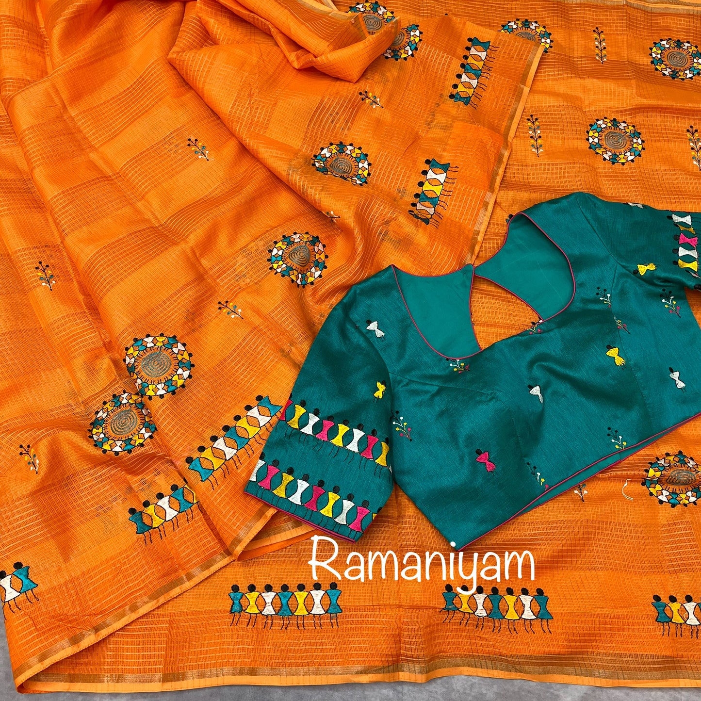 Orange Kota saree with warli embroidery