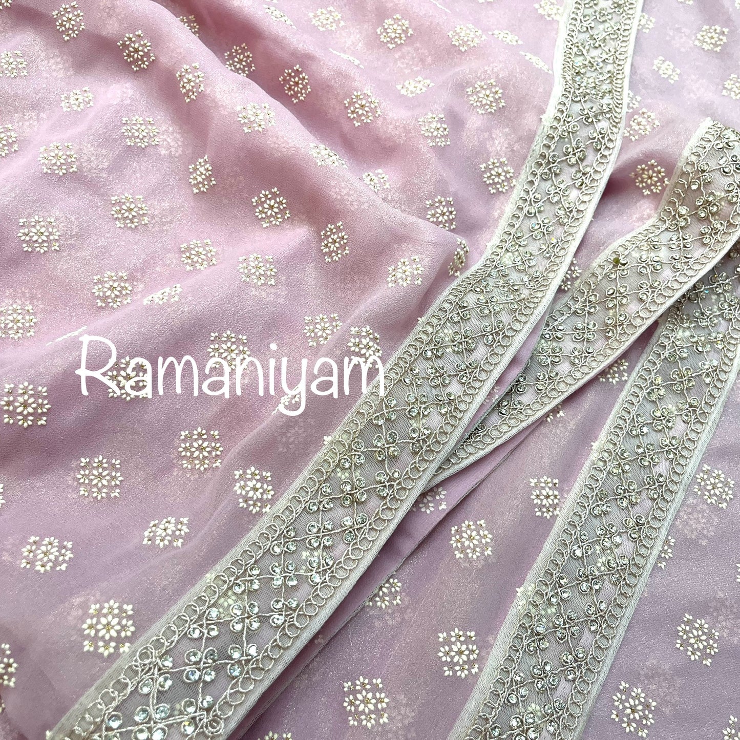 Rose pink tissue georgette saree with stone work borders and metallic rose pink blouse