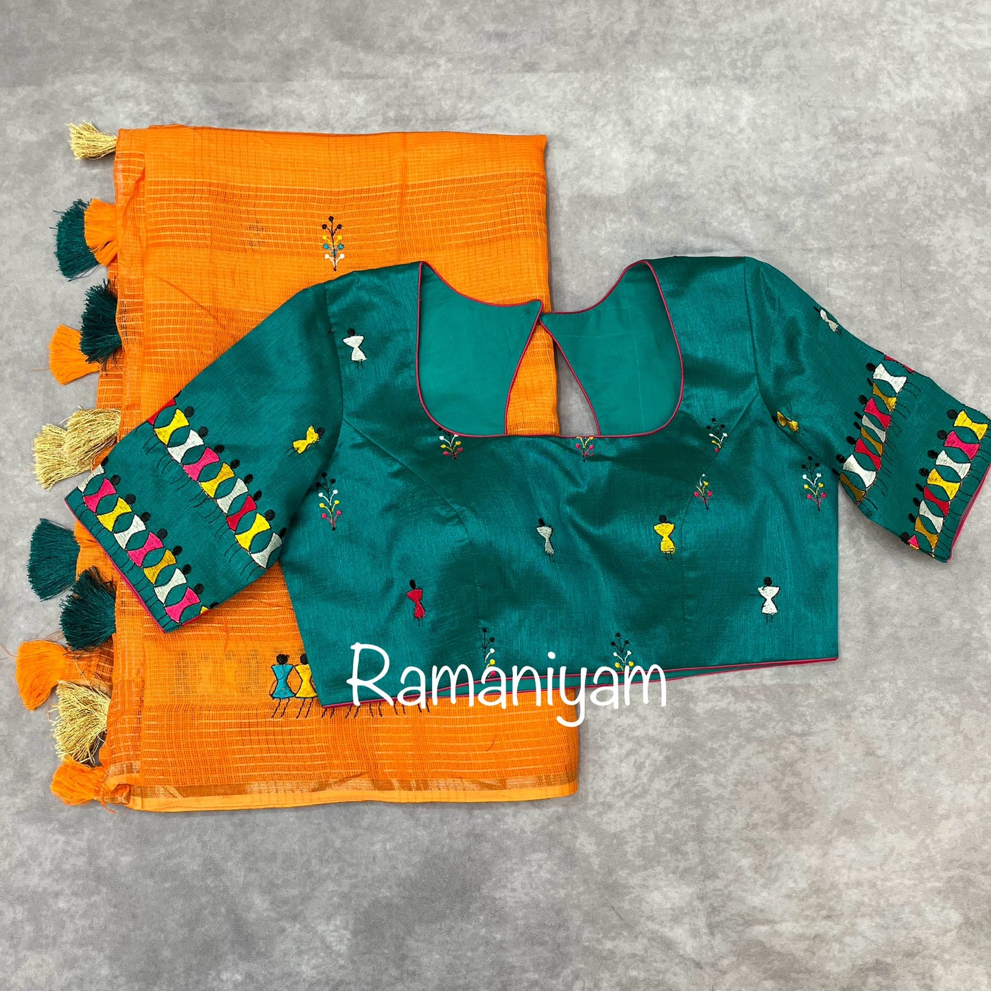 Orange Kota saree with warli embroidery