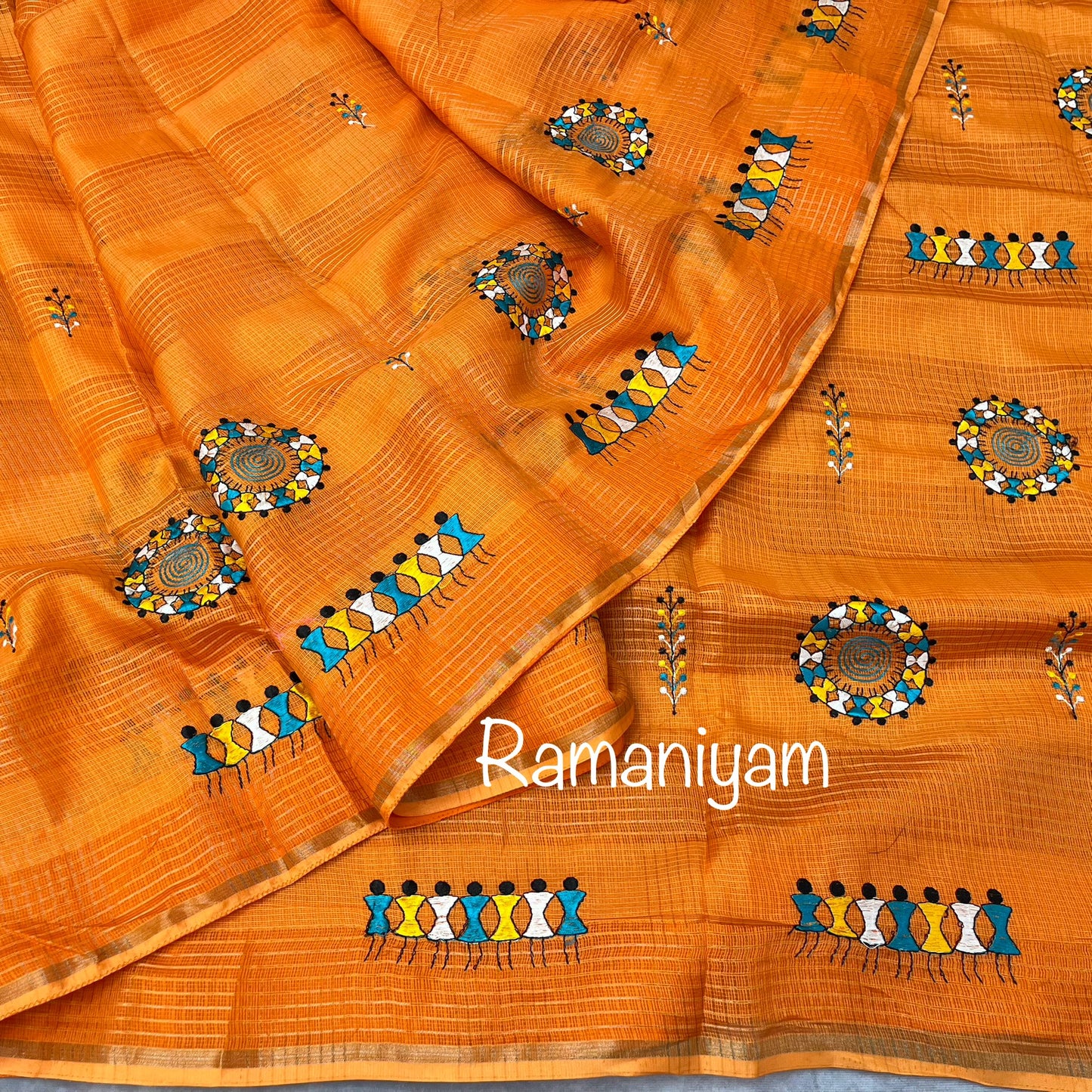 Orange Kota saree with warli embroidery