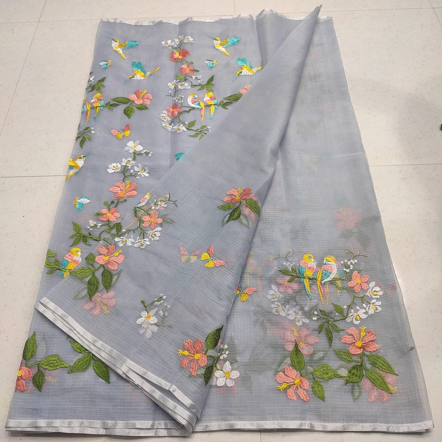 Grey Kota embroidery saree paired with a stitched blouse