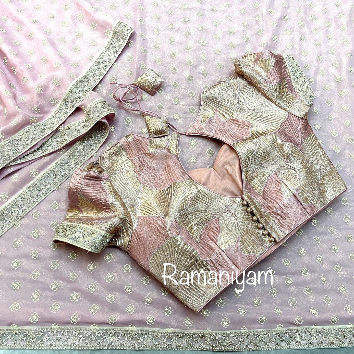 Rose pink tissue georgette saree with stone work borders and metallic rose pink blouse
