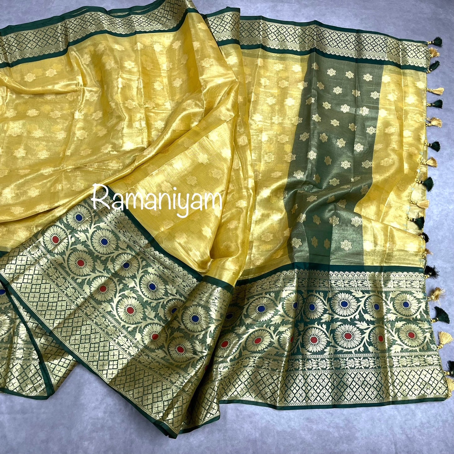 Gold tissue saree / Bottle green stitched blouse
