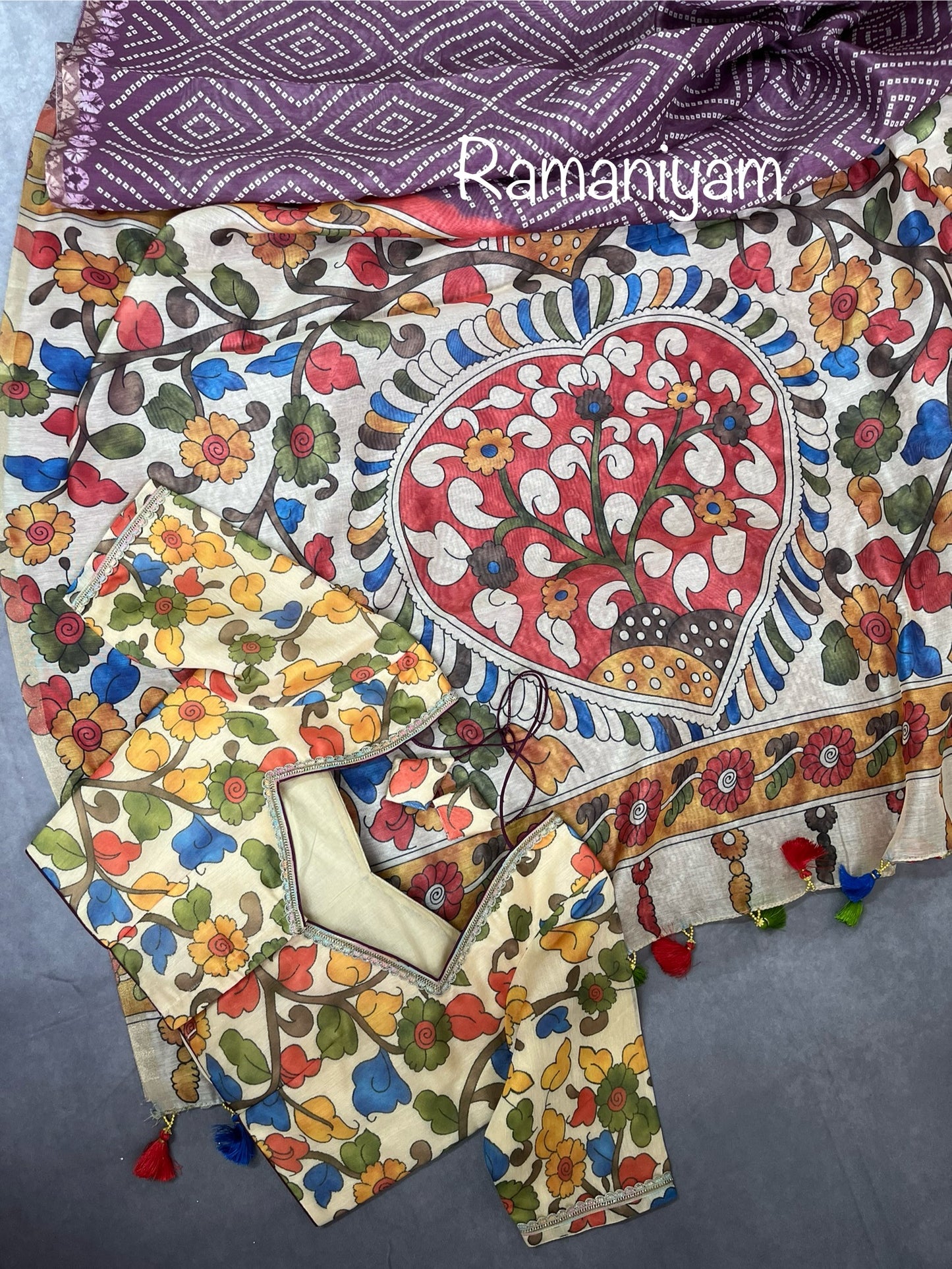 Wine color Organza Bandhani saree with a Kalamkari pallu