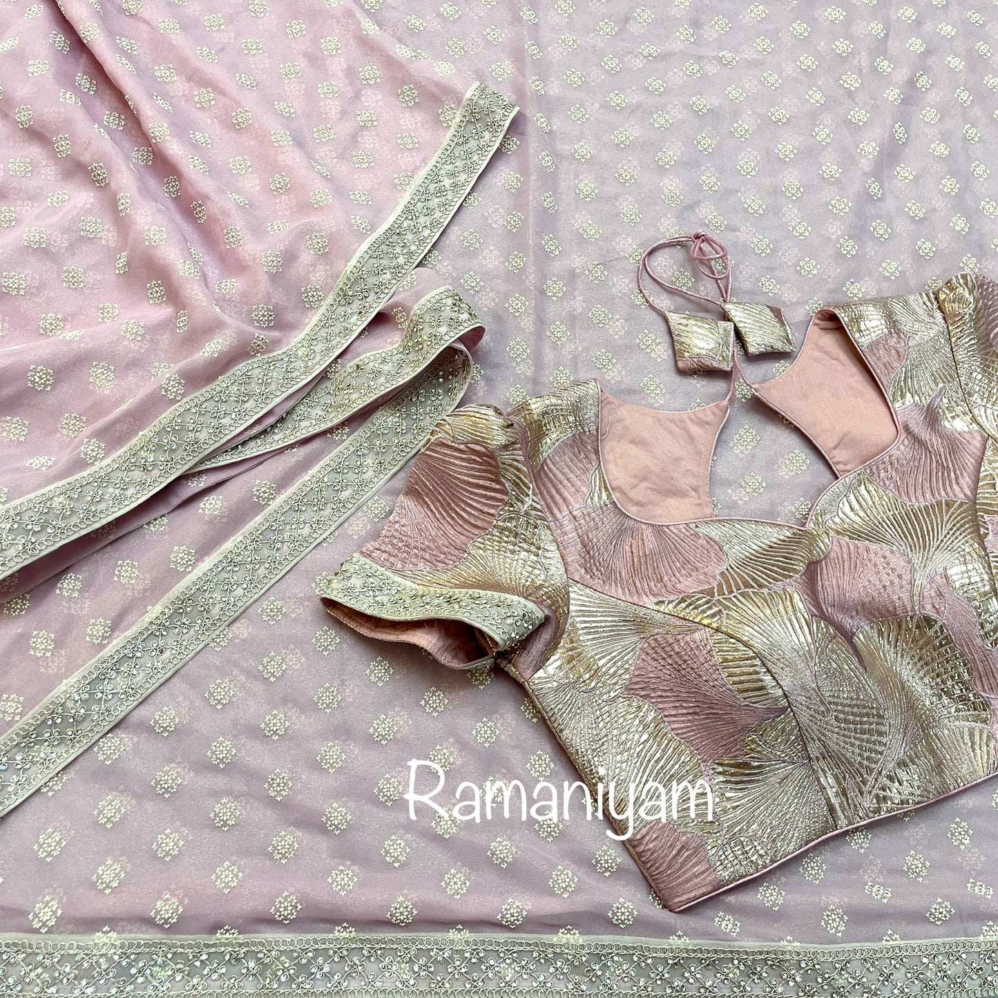 Rose pink tissue georgette saree with stone work borders and metallic rose pink blouse