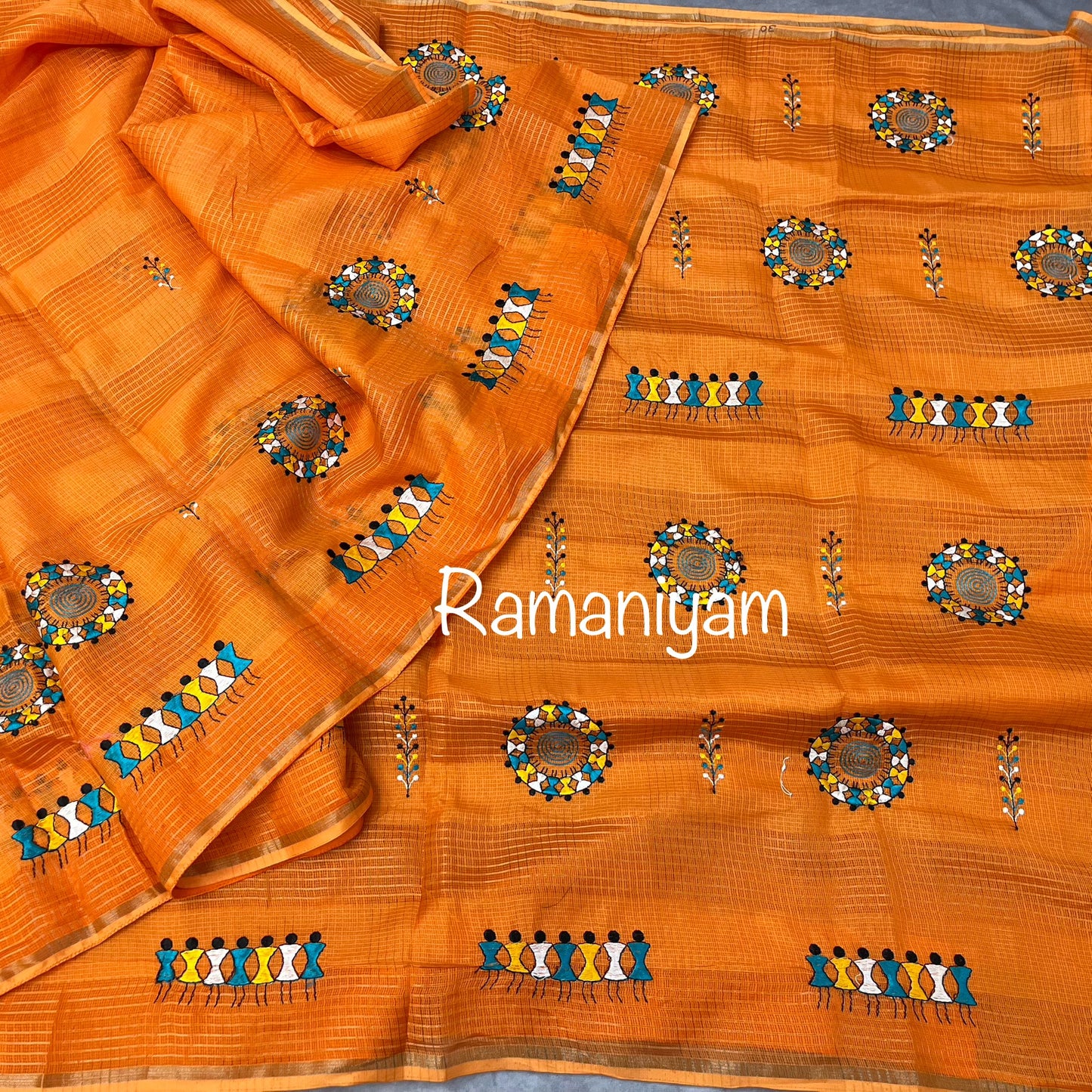 Orange Kota saree with warli embroidery