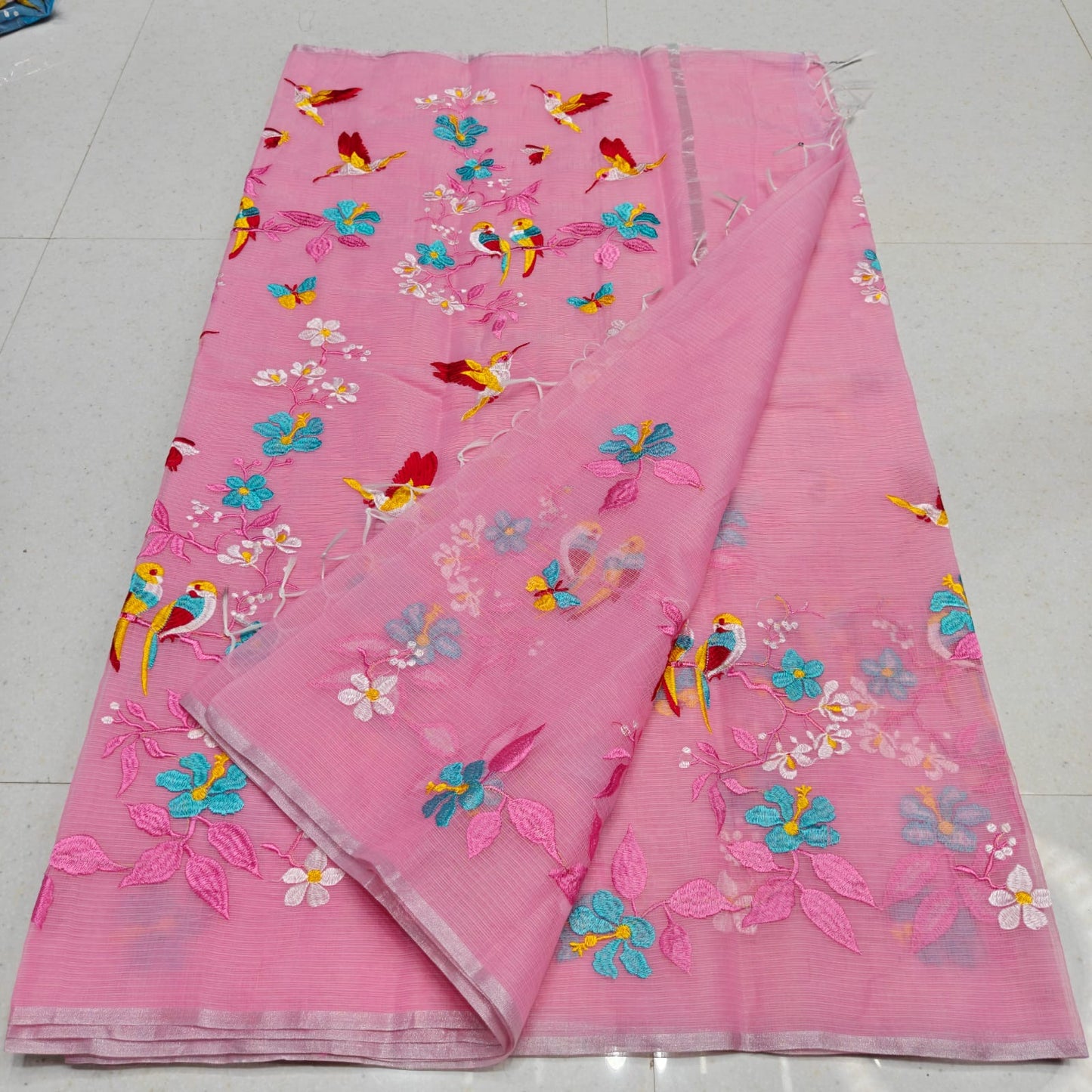 Rose pink Kota embroidery saree paired with a stitched blouse