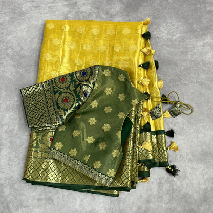 Gold tissue saree / Bottle green stitched blouse
