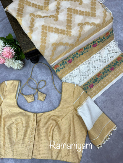 Off-white Banarasi saree adorned with mesmerizing meenakari and cutwork border