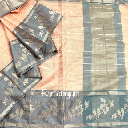 Pastel peach Kota saree with contrast grey border with parrot motifs