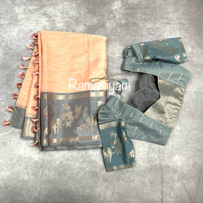 Pastel peach Kota saree with contrast grey border with parrot motifs