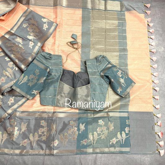Pastel peach Kota saree with contrast grey border with parrot motifs